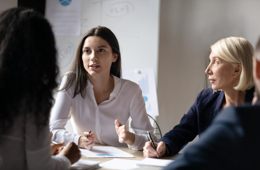 Employees discussing learning and development strategy