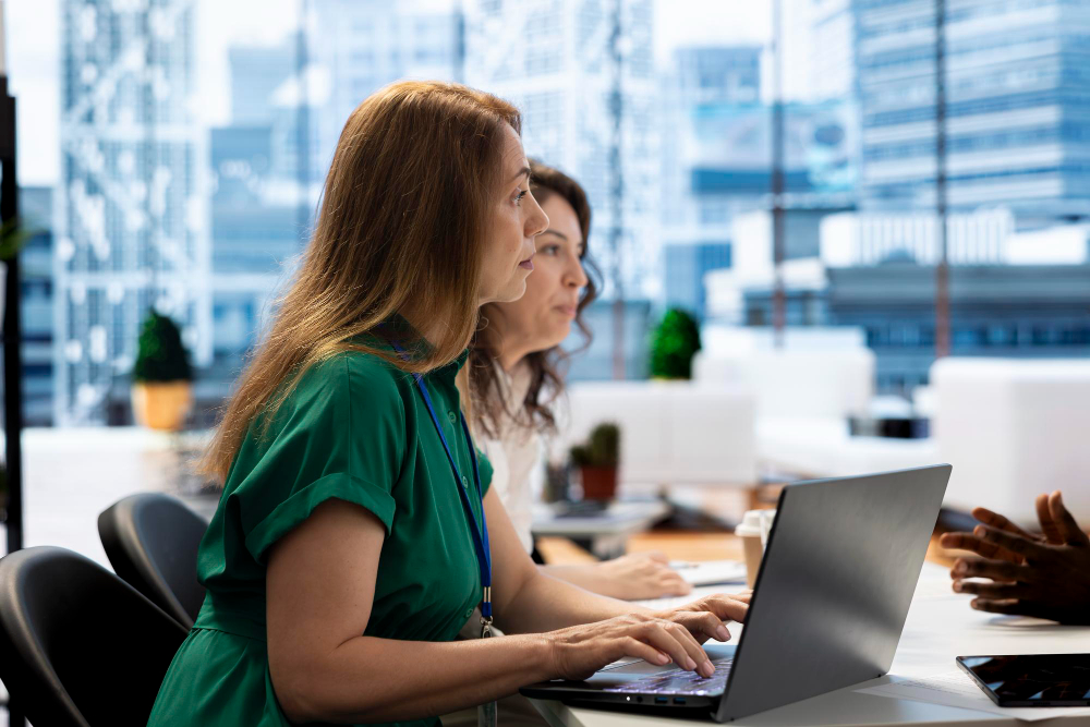 Employees utilizing emotional intelligence skills to maintain focus and control emotions